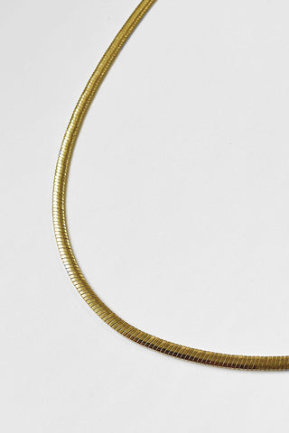 Gold plated brass wide Noah Necklace by Kara Yoo. 