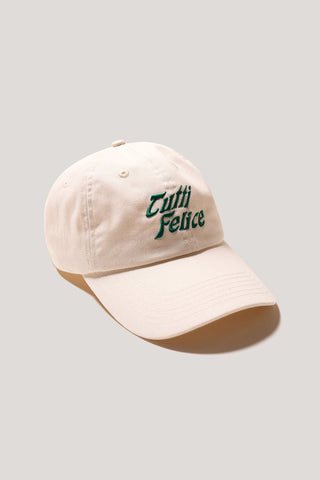 Cream baseball cap with green "Tutti Felice" embroidery. 