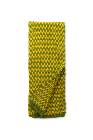 Green & yellow chunky knit lambswool scarf against a white background. 