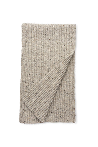 A folded ribbed knit scarf in a warm oatmeal beige color with subtle dark flecks, shown on a plain white background.
