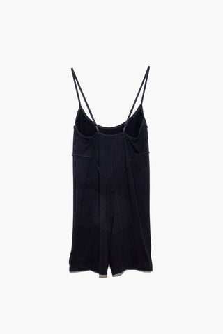 Back view of black fitted romper with thin shoulder straps. 