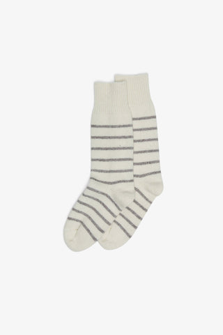 Natural and grey stripe wool socks on white background. 