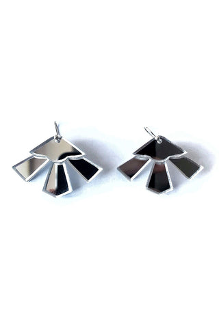 Silver mirror plexiglass Lotus earrings by Mim Té. 