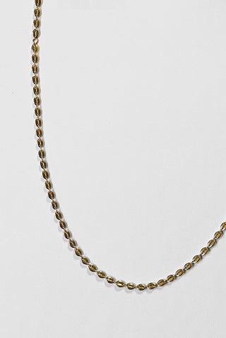 Close-up of Gemma necklace by Kara Yoo. 