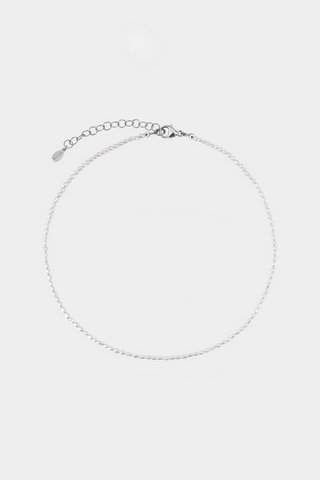 Silver & freshwater pearl necklace on white background.