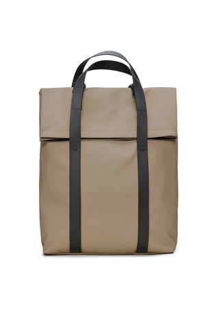 Beige waterproof fold over tote bag with black straps on white background. 
