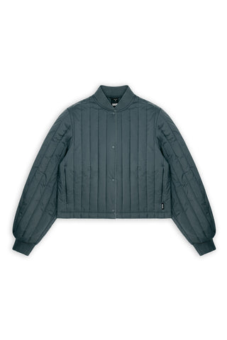 A dark teal quilted jacket with a snap button closure, laid flat against a solid white background.