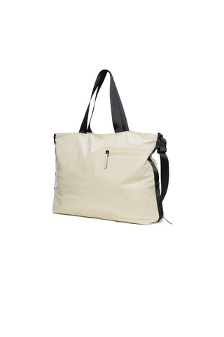 Shiny beige large messenger tote bag with black carry handles and adjustable shoulder straps. 