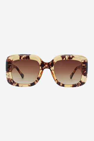 Transparent tortoise shell oversized square shaped sunglasses. 