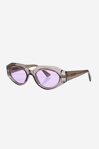 Grey transparent sunglasses with purple lenses on white background. 