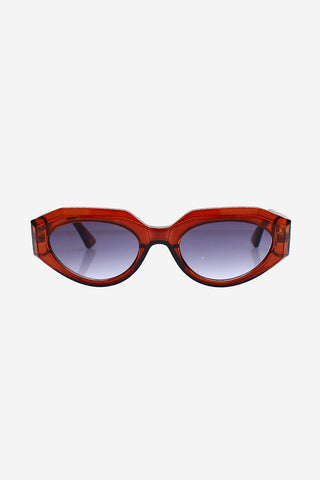 Chocolate brown acetate sunglasses with dark grey lenses on white background. 