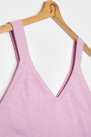 Close-up of pink recycled + organic cotton blend v-neck Clara tank top by Rifo. 