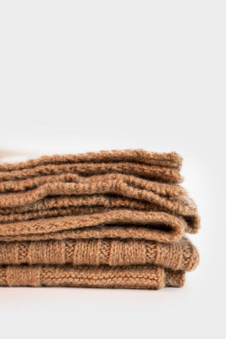 Cork Beige recycled cashmere cable knit Elide blanket by Rifo. 