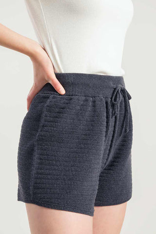 Close-up of grey sporty recycled cotton / organic cotton blend Stella Shorts by Rifo. 