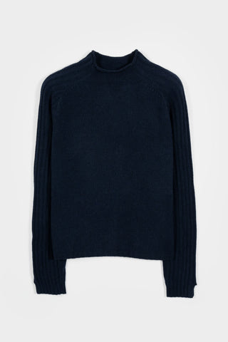 Flat lay photo of black knit Loretta sweater by Rifo. 