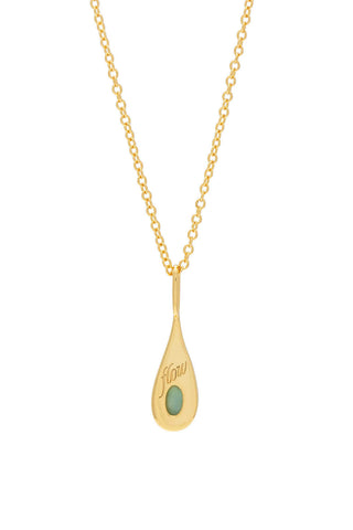 Gold necklace with gold and green Amazonite stone teardrop pendant on white background. 