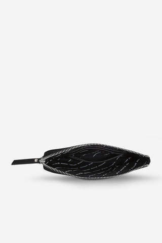 Inside black leather Smoke & Mirror pouch by Status Anxiety. 