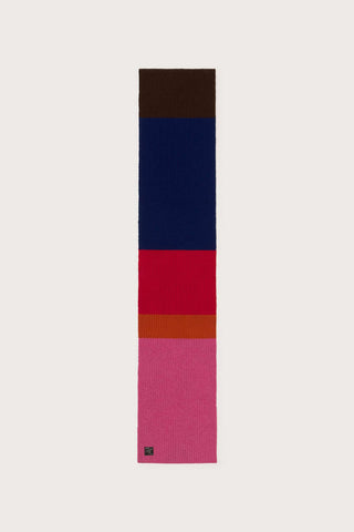 Flat lay image of pink, red & blue stripe wool rib knit Ghede Scarf. 