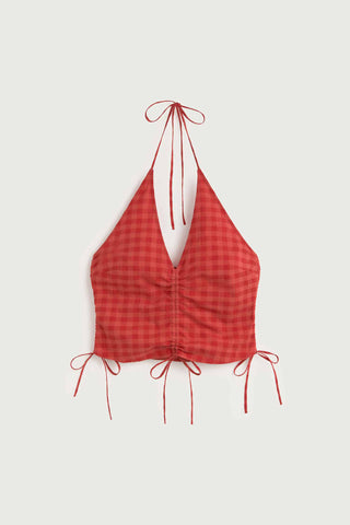 Red checkered halter-neck shirt with ruching detail on front. 