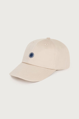 Cream baseball cap with navy blue sun embroidery. 