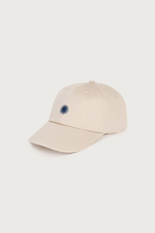 Ivory embroidered sun Chris cap by Thinking Mu. 