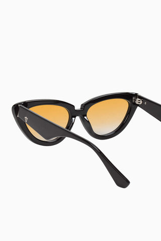 Valley Eyewear Dayze sunglasses with gloss black frames and orange gradient lenses. 