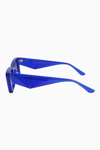 Side view of Valley Eyewear Lahara Sunglasses in electric blue with black gradient lenses. 