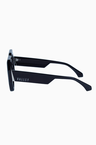 Side view of Valley Eyewear Monolith Gloss Black sunglasses. with black fade lenses. 