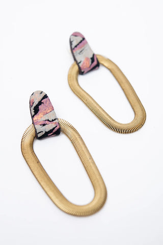 Multi-coloured leather and brass 9e Avenue earring by Veinage. 