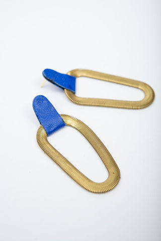 Electric blue leather and brass 9e Avenue earring by Veinage. 