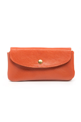Coral leather wallet with brass snap closure. 