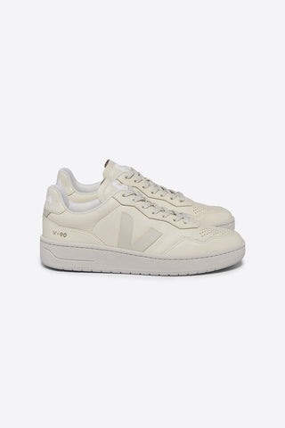 Side view of Veja V-90 Organic Traded Leather Cashew Pierre eco-friendly sneakers. 
