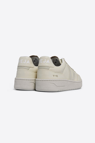 Back view of Veja V-90 Organic Traded Leather Cashew Pierre eco-friendly sneakers. 