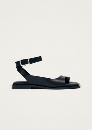 Black leather toe ring sandal with ankle strap. 