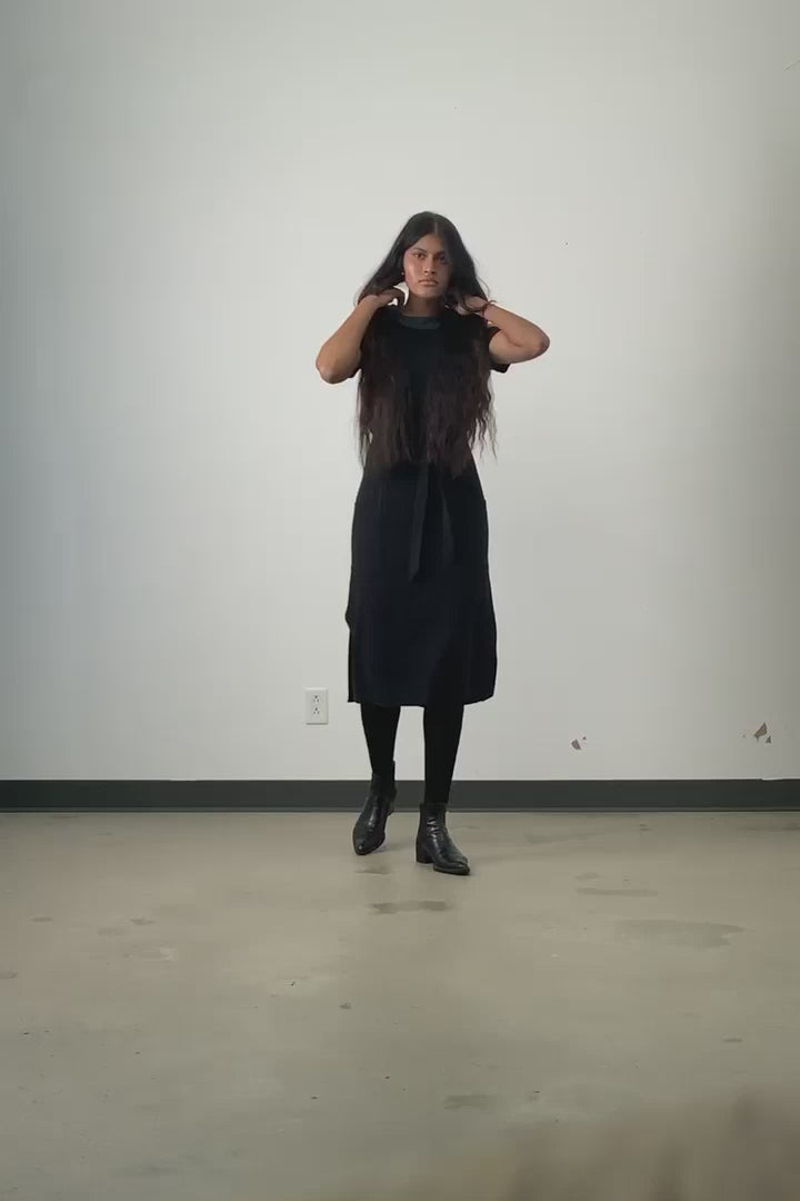 Video of model wearing Jennifer Glasgow Meri Dress in black linen blend. 