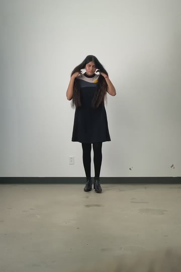 Video of model wearing Jennifer Glasgow Vanora A-line colour blocked dress in black OEKO-TEK linen blend.
