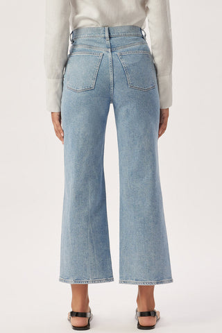 Back view of DL1961 organic cotton Hepburn wide leg jeans in Reef wash. 