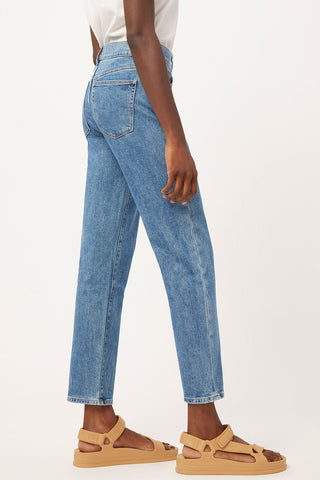 Side view of DL1961 Organic Cotton Patti Straight high rise jeans in vintage blue rapids wash. 