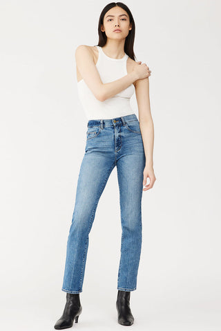 Model wearing DL1961 Patti straight leg high rise jeans. 