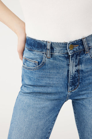 Closeup of waistband on DL1961 Patti straight leg high rise cuffed jeans. 