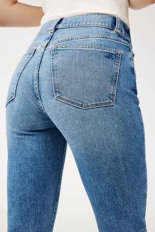 Closeup of back pocket on DL1961 Patti straight leg high rise cuffed jeans. 