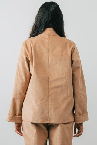 Back view of model wearing vintage inspired workwear Gailia Jacket in camel cord by Jennifer Glasgow. 