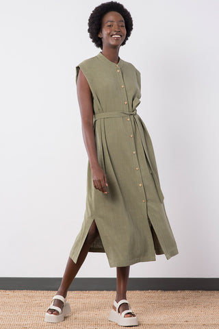 Model wearing sage linen blend button up Helena Dress by Jennifer Glasgow. 