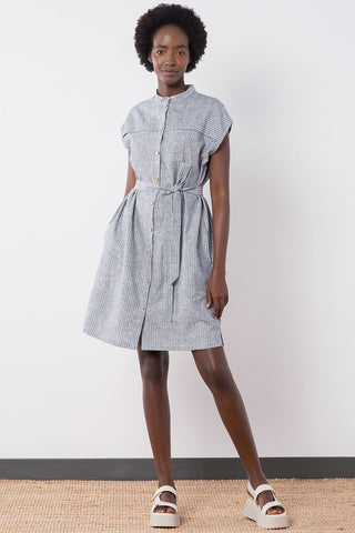 Model wears navy stripe organic cotton / hemp blend belted button up Wren Dress by Jennifer Glasgow. 