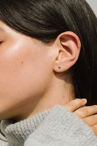 silver heart shaped Aimee Stud earrings by Kara Yoo. 