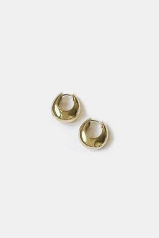 Chunky gold vermeil Hazel Hoop earrings by Kara Yoo. 