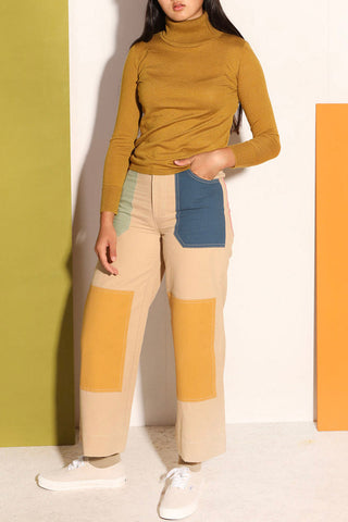 Model wearing chartreuse Joshua turtleneck by LF Markey. 