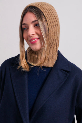 Model wearing tan coloured recycled cashmere Arsenio Balaclava by Rifo. 