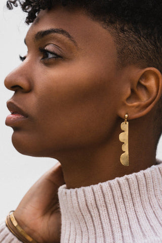 Model wearing gold plated Hills Earrings by Tilly D'Oro